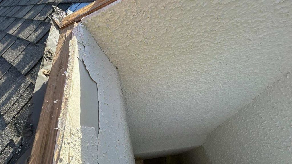 An image showing water damaged drywall in the skylight shaft.