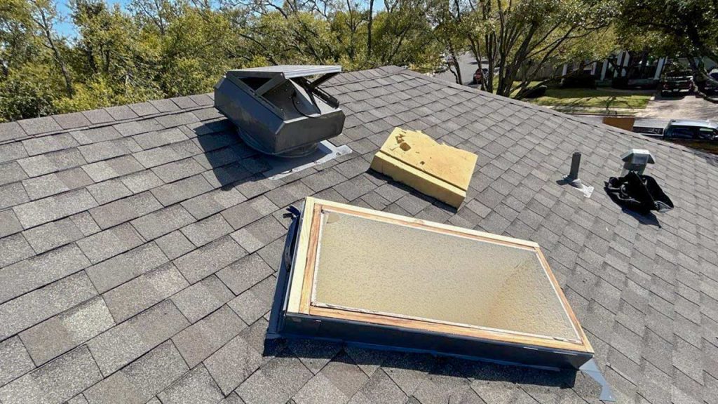 Flashing and shingles have been installed.