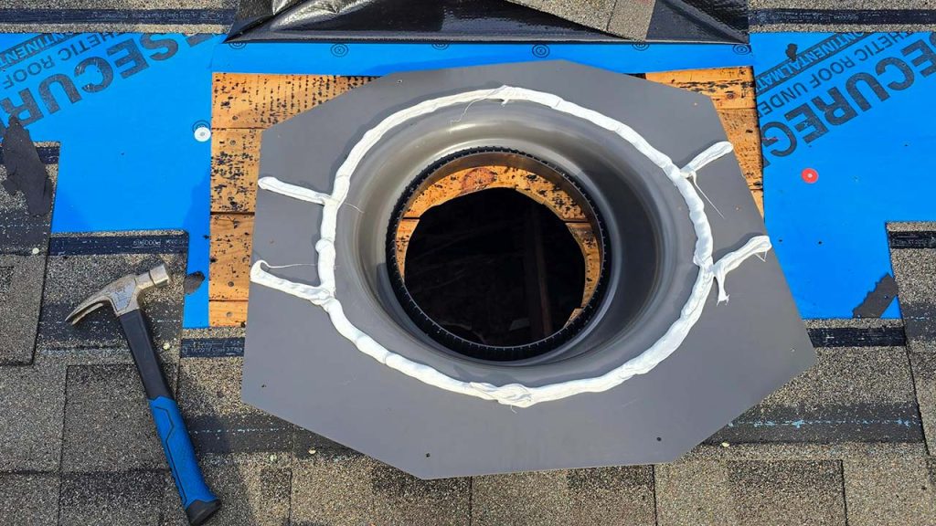 The velux Sun Tunnel flashing is caulked prior to installation.