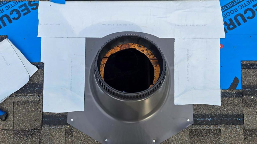 The installed flashin is surrounded with underlayment.