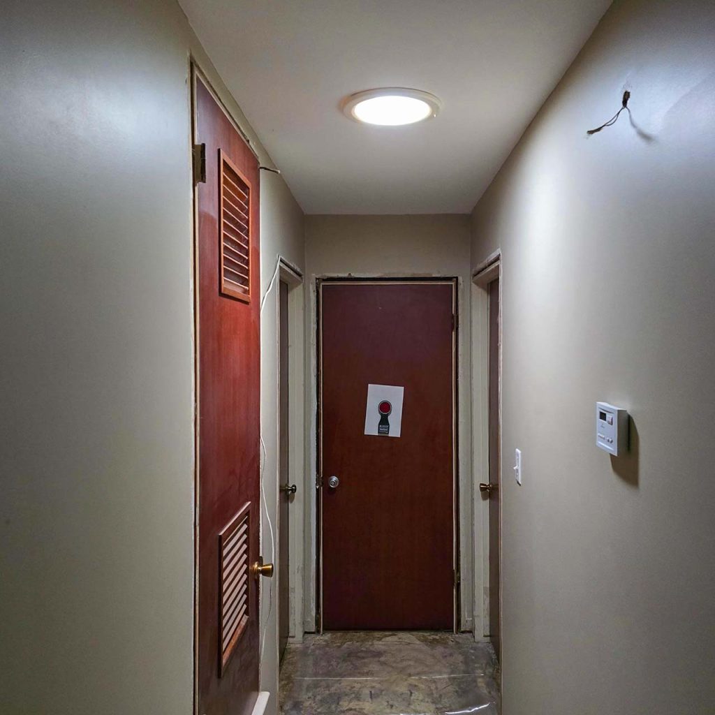 An interior view of the Sun Tunnel installed in a hallway.