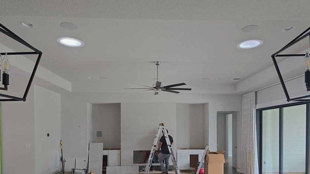 An interior view of the ceiling with two os the installed Velux Sun Tunnels